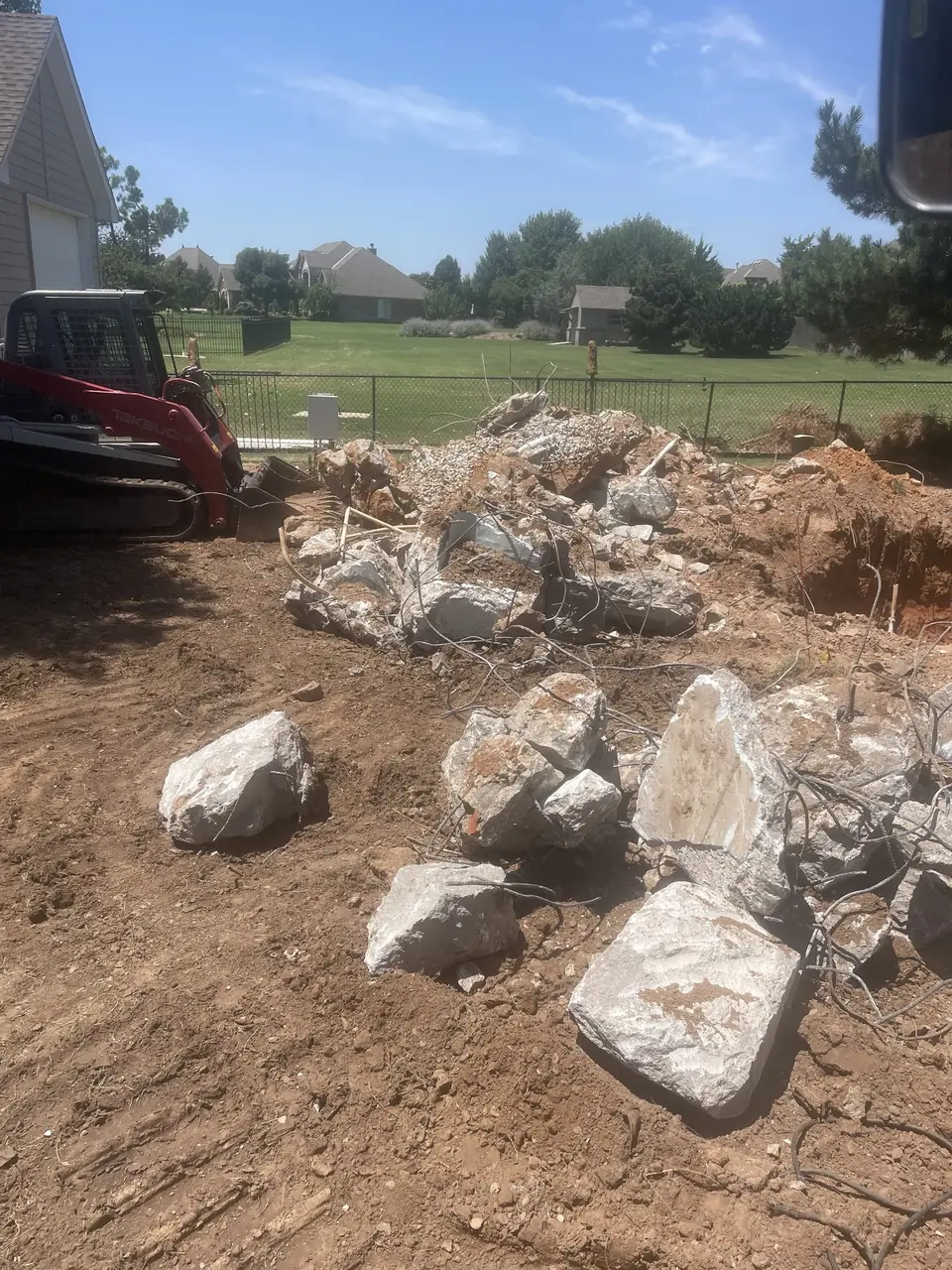 Broken concrete staged for haul off