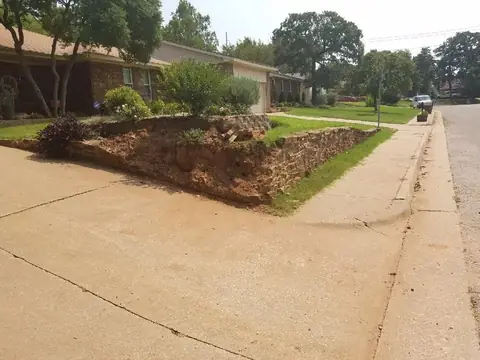 Sidewalk and front yard after concrete work